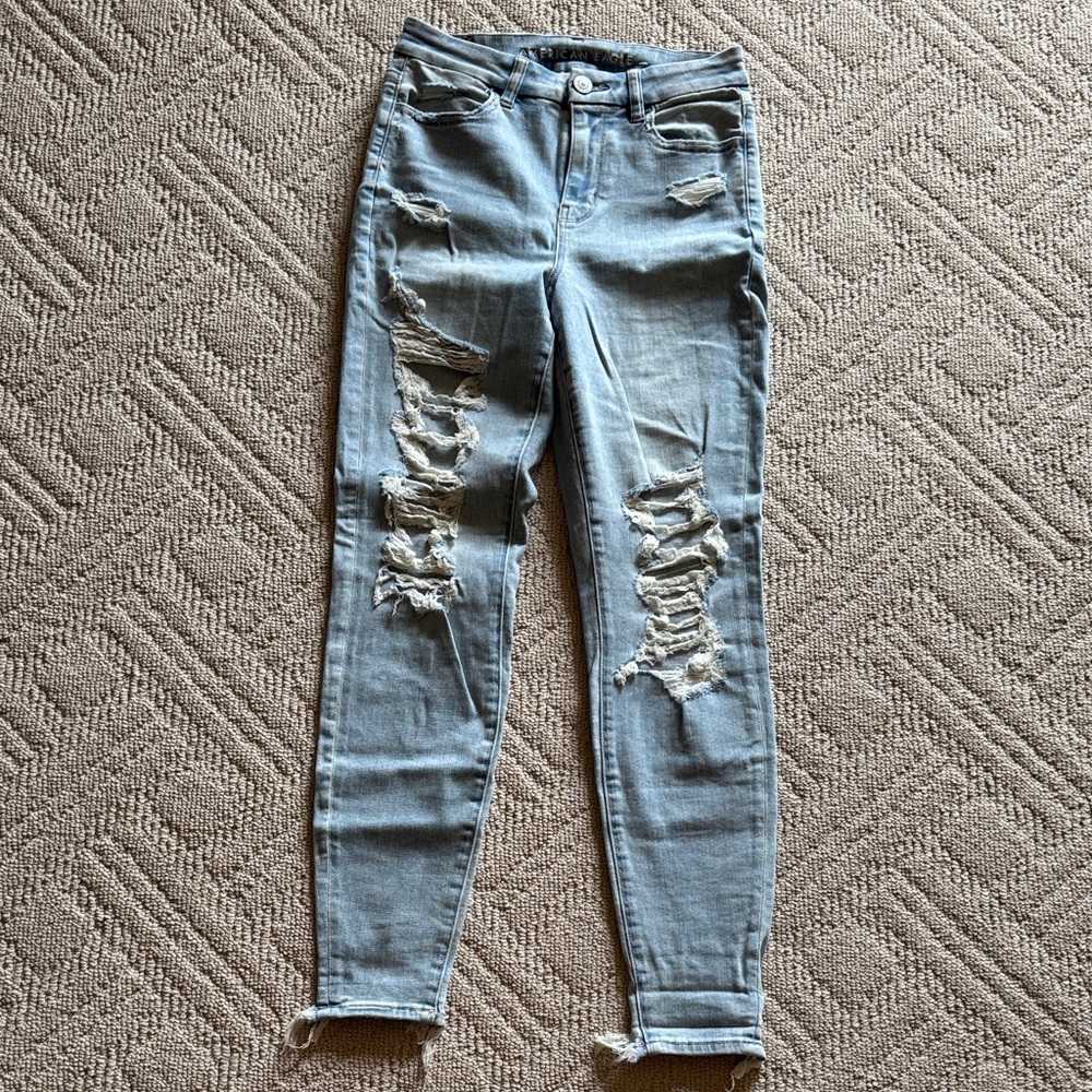 American Eagle Outfitters Light Blue Distressed curvy high rise jegging